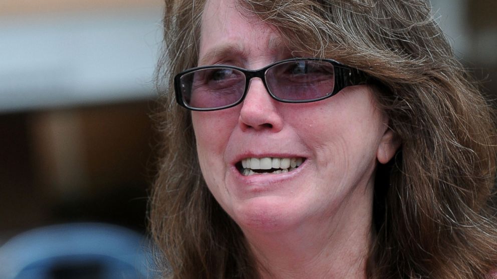 Christine Leinonen waits for information outside of the Orlando Regional Medical Center about her son Chris who is missing after a fatal shooting and hostage situation at Pulse nightclub on June 12, 2016 in Orlando, Florida.