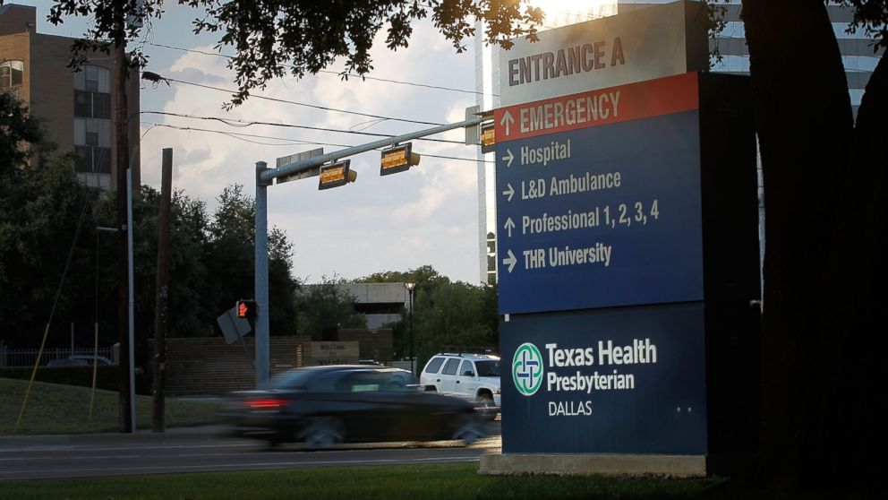 Traffic moves past Texas Health Presbyterian Hospital Dallas where a patient has been diagnosed with the Ebola virus on Sept. 30, 2014 in Dallas, Texas.