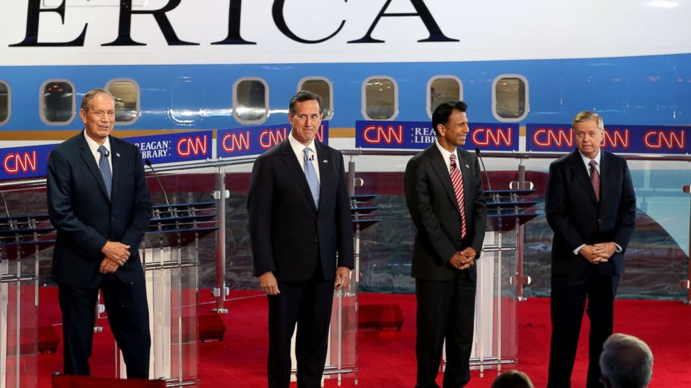 Republican presidential candidates, George Pataki, Rick Santorum, Louisiana Gov. Bobby Jindal and Senator Lindsey Graham stand onstage during the presidential debates at the Reagan Library on Sept.16, 2015 in Simi Valley, Calif.
