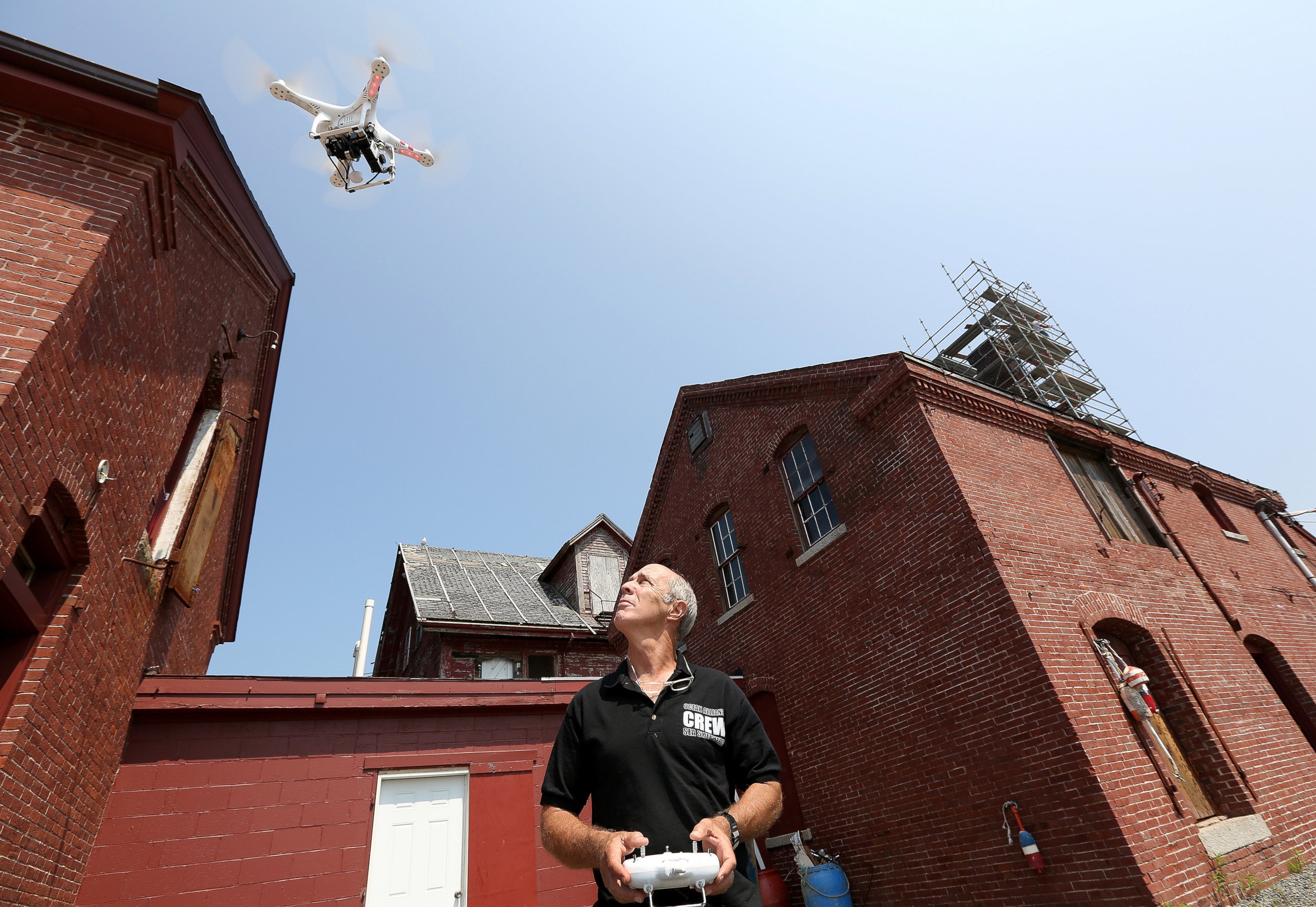 PHOTO: Lain Kerr, CEO of Ocean Alliance, demonstrates the use of a DJI-drone on July 23, 2014. Ocean Alliance uses drones as research tools to collect information on whales and the ocean environment.