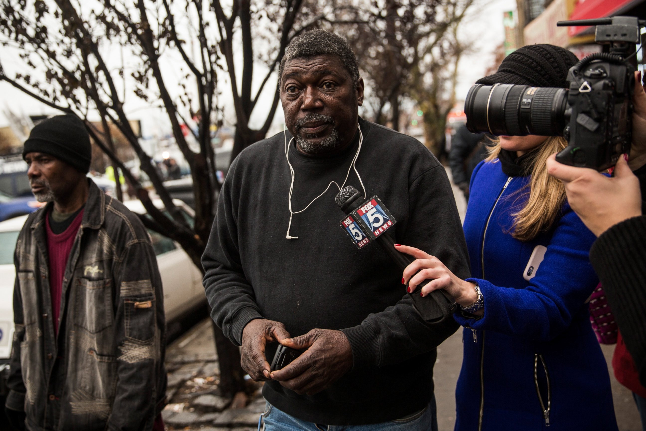 PHOTO: Benjamin Carr, father of Eric Garner who was killed by a police officer who put him in a choke hold, speaks to the media outside the beauty salon where his son was killed, Dec. 3, 2014 in Staten Island, New York. 