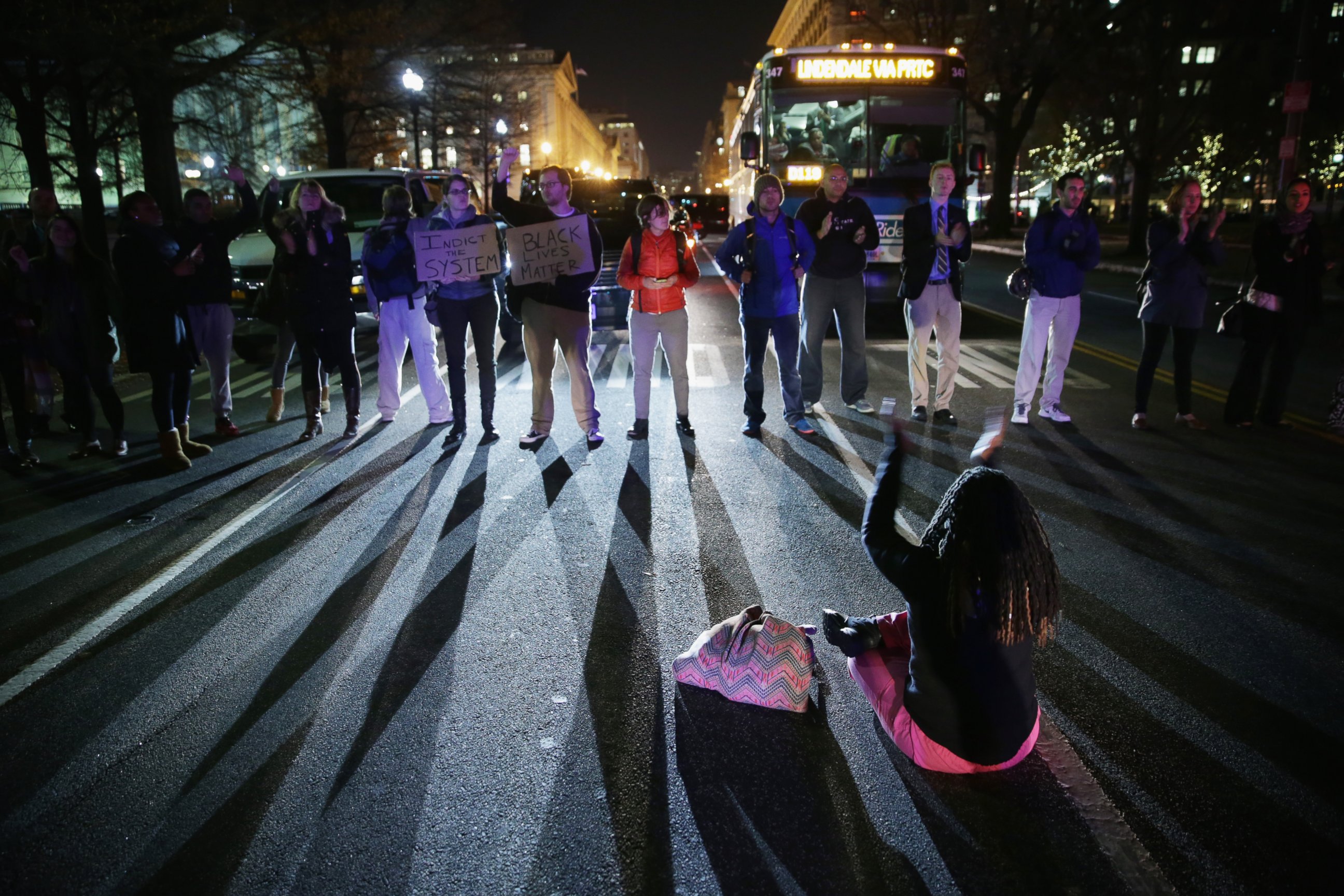 PHOTO: Demonstrators block traffic at 15th Street and Pennsylvania Avenue, NW, during a protest against a New York grand jury decision Dec. 3, 2014 in Washington, DC.