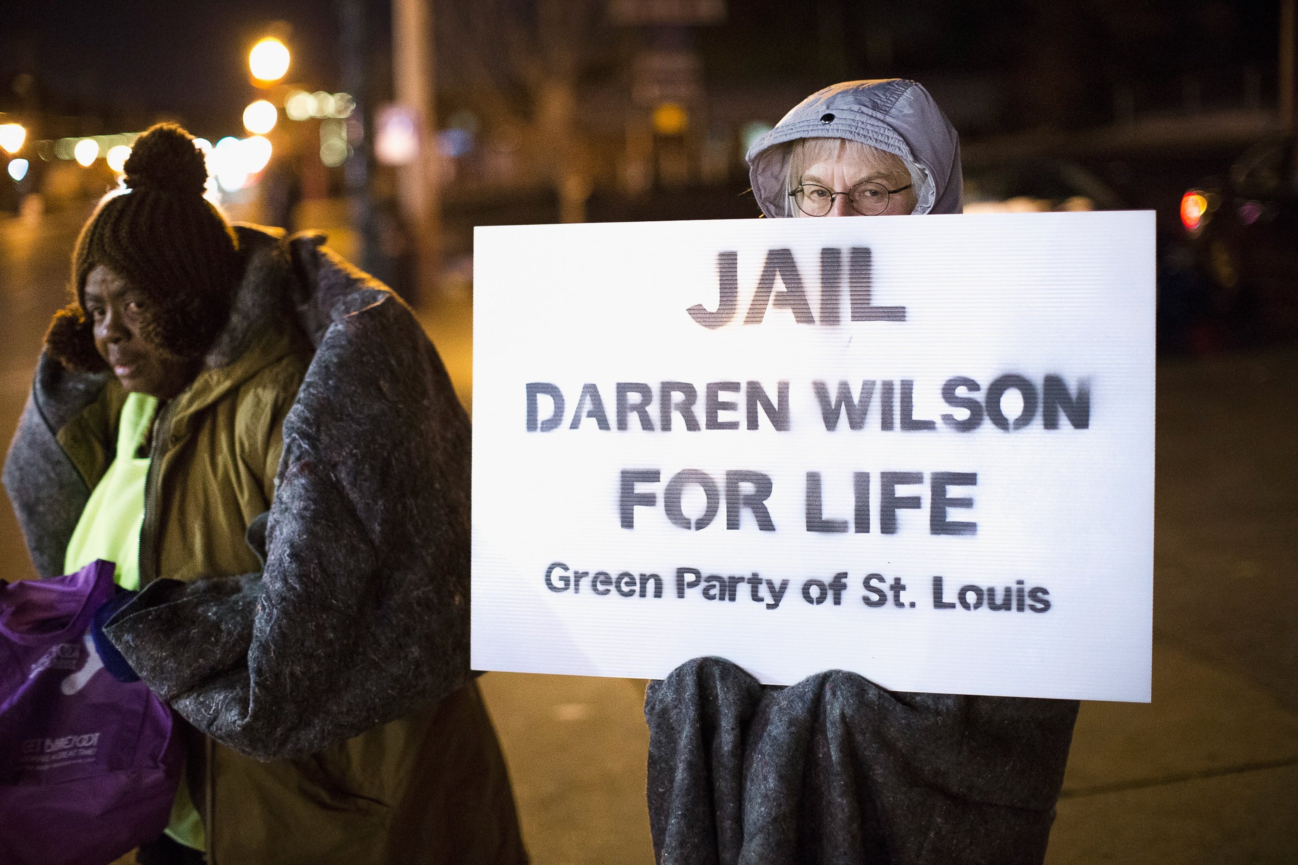 PHOTO: Demonstrators protest the shooting death of 18-year-old Michael Brown across from the police station on Nov. 17, 2014 in Ferguson, Mo.