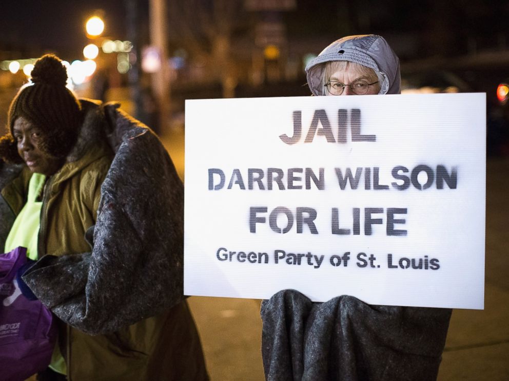 PHOTO: Demonstrators protest the shooting death of 18-year-old Michael Brown across from the police station on Nov. 17, 2014 in Ferguson, Mo.