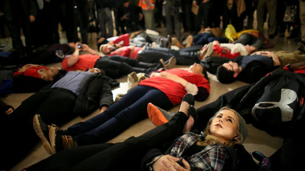 PHOTO: People lie down during a protest in Grand Central Terminal on Dec. 3, 2014 in New York after a Grand Jury decided to not indict officer Daniel Pantaleo for Eric Garner's death in July.