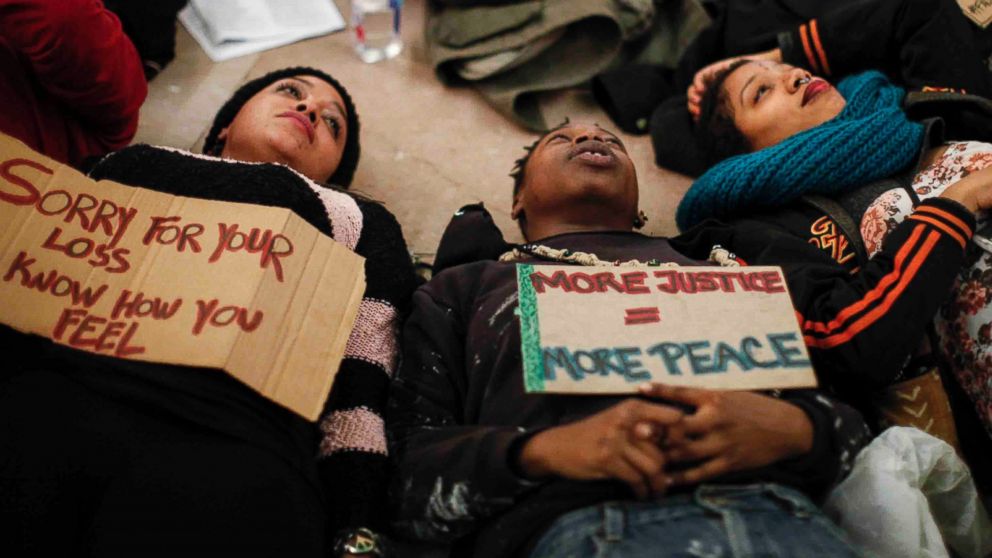 PHOTO: People lie down during a demonstration against police violence in Grand Central Station on Dec. 22, 2014 in New York City.