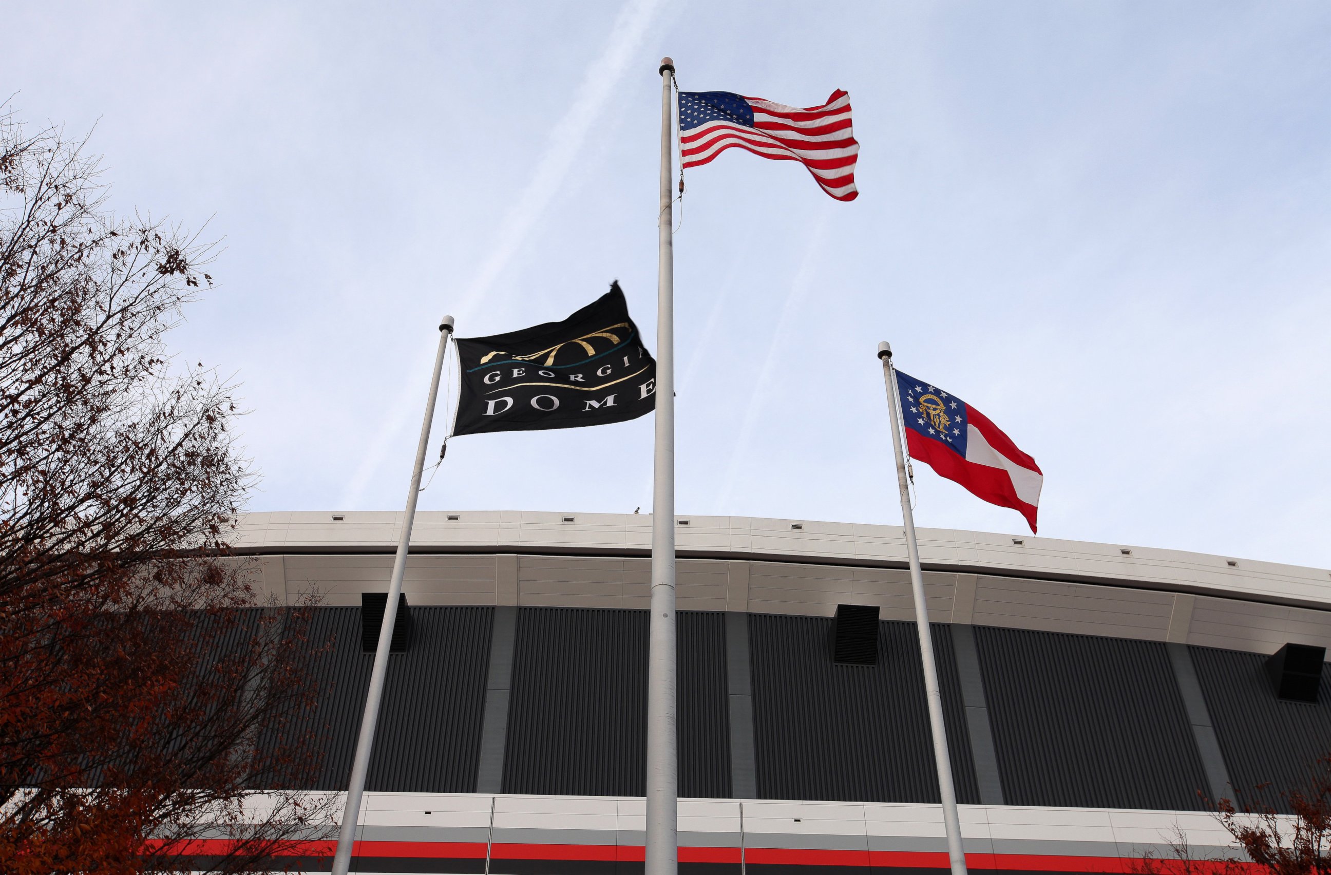 PHOTO: Georgia Dome Flag, American Flag and the Georgia State Flag, flies outside the Georgia Dome in Atlanta, Georgia on Nov. 23, 2013.  