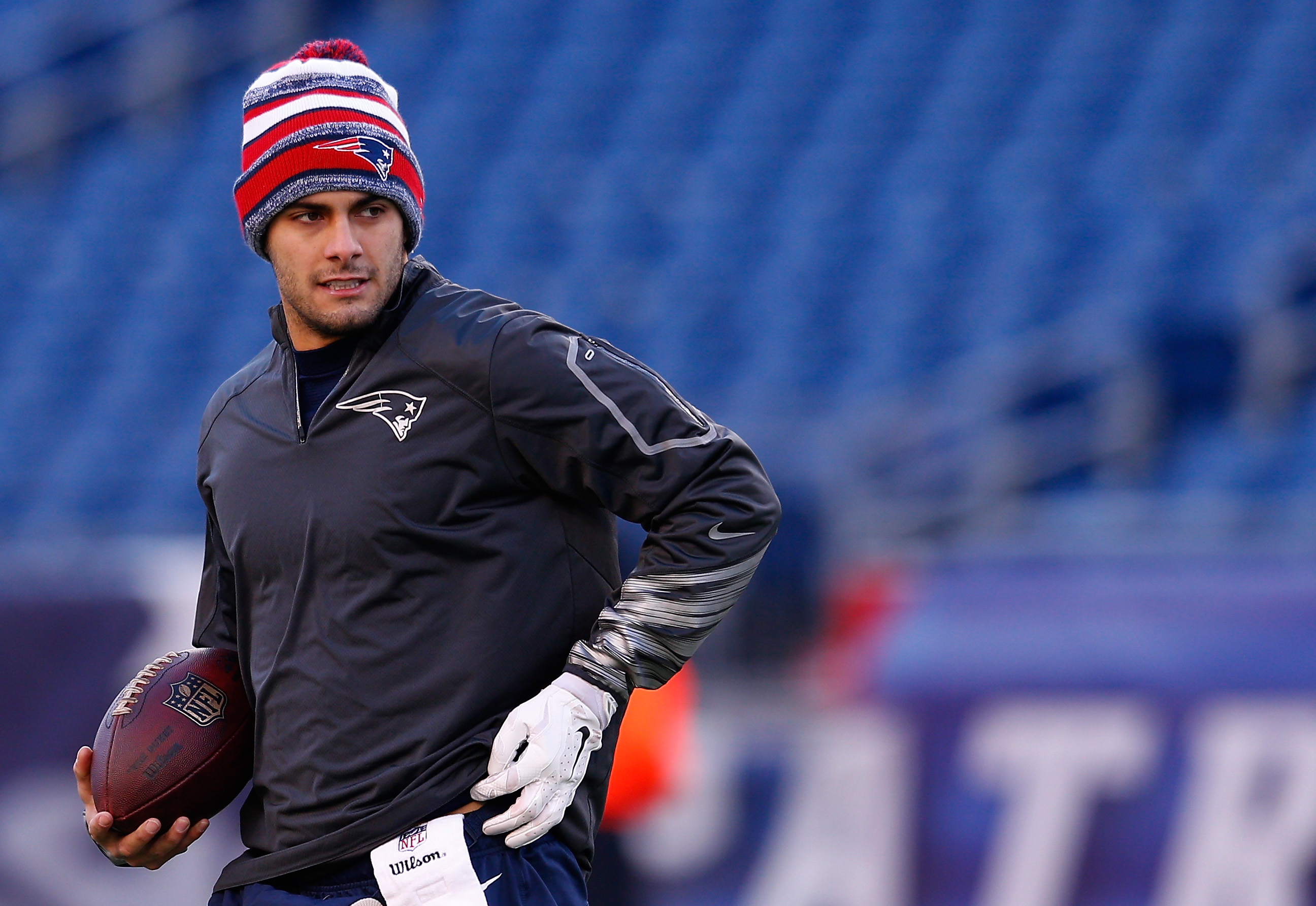 PHOTO: Jimmy Garoppolo of the New England Patriots warms up before the 2014 AFC Divisional Playoffs game against the Baltimore Ravens  on Jan. 10, 2015 in Foxboro, Mass.