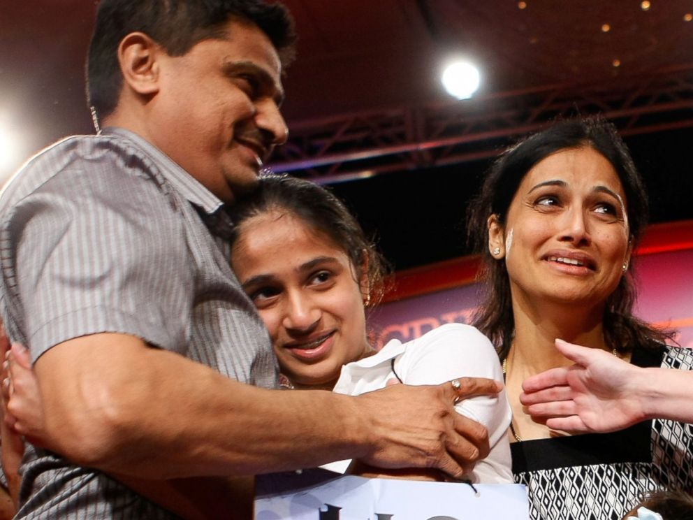 PHOTO: Kavya Shivashankar of Olathe, Kansas, receives a hug from her parents Mirle and Sandy after she won the 2009 Scripps National Spelling Bee competition May 28, 2009 in Washington, DC.