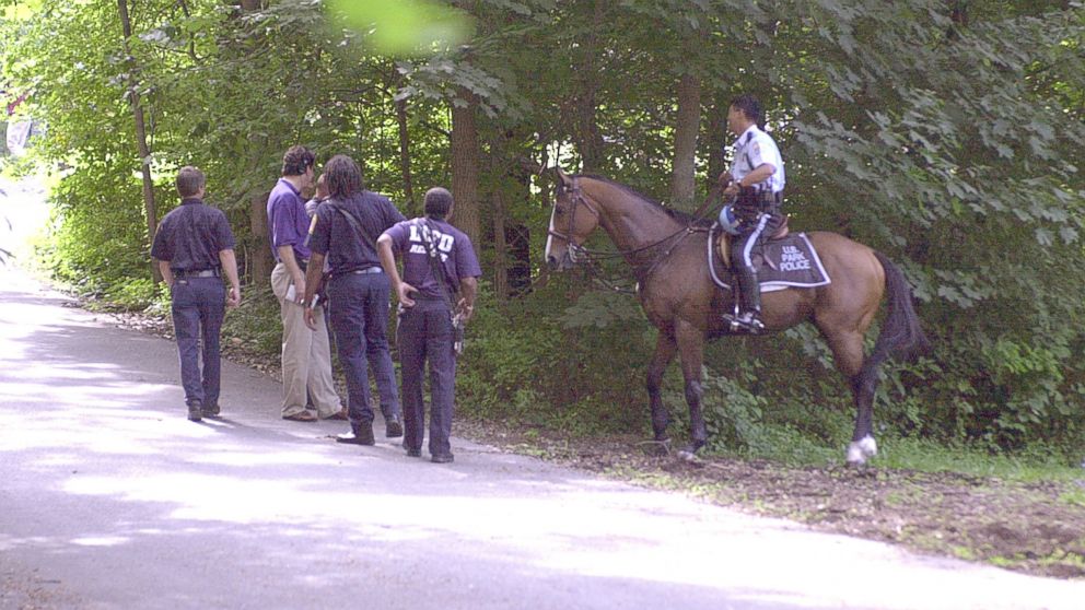 PHOTO: US Park police and fire fighters searching wooded area of park for evidence leading to whereabouts of missing Washington intern Chandra Levy, July 16, 2001.