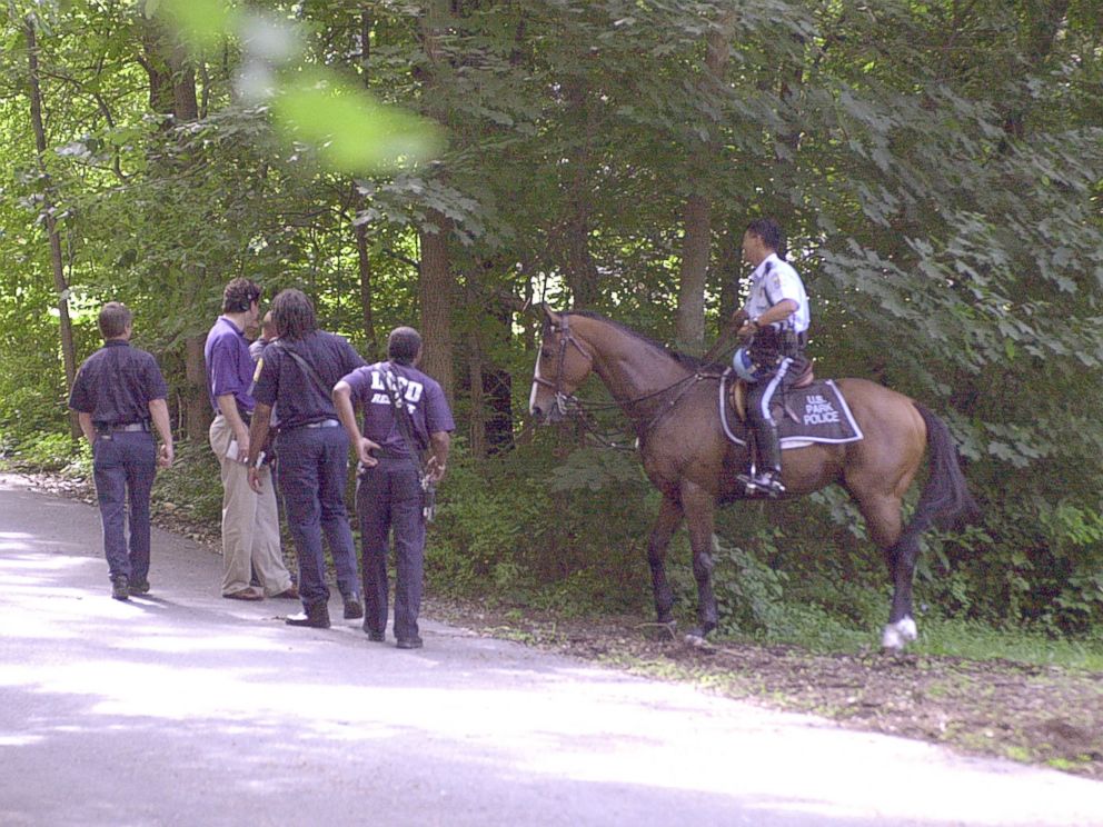 PHOTO: US Park police and fire fighters searching wooded area of park for evidence leading to whereabouts of missing Washington intern Chandra Levy, July 16, 2001.