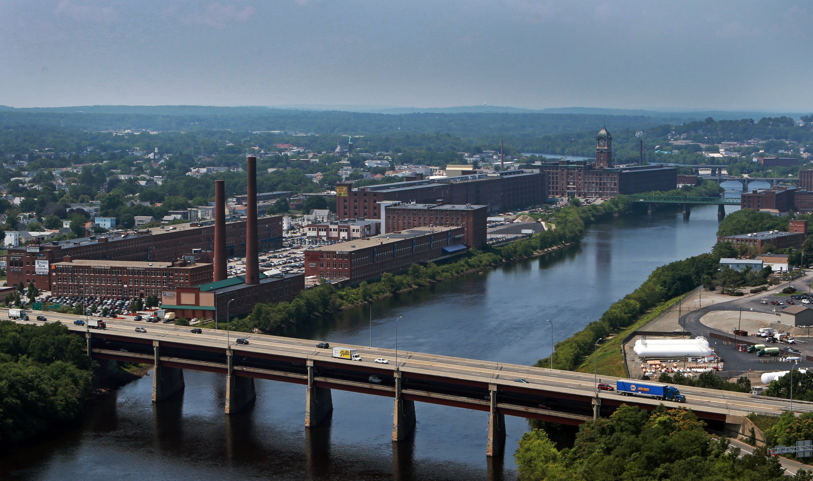 PHOTO: An aerial view of the mills along the Merrimack River in Lawrence with Route 495 in the foreground, Aug. 5, 2014.