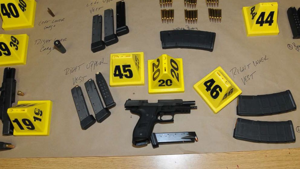 An undated police handout photo shows the firearms and ammunition found on or in close proximity to Adam Lanza's body at Sandy Hook Elementary School following the Dec. 14, 2012 shooting rampage.