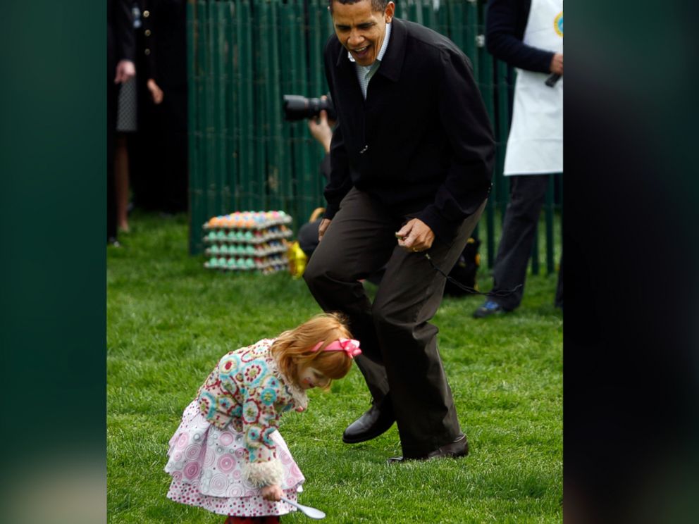 PHOTO: President Barack Obama encourages participants at the start of the White House Easter Egg Roll on the South Lawn of the White House, April 13, 2009 in Washington.