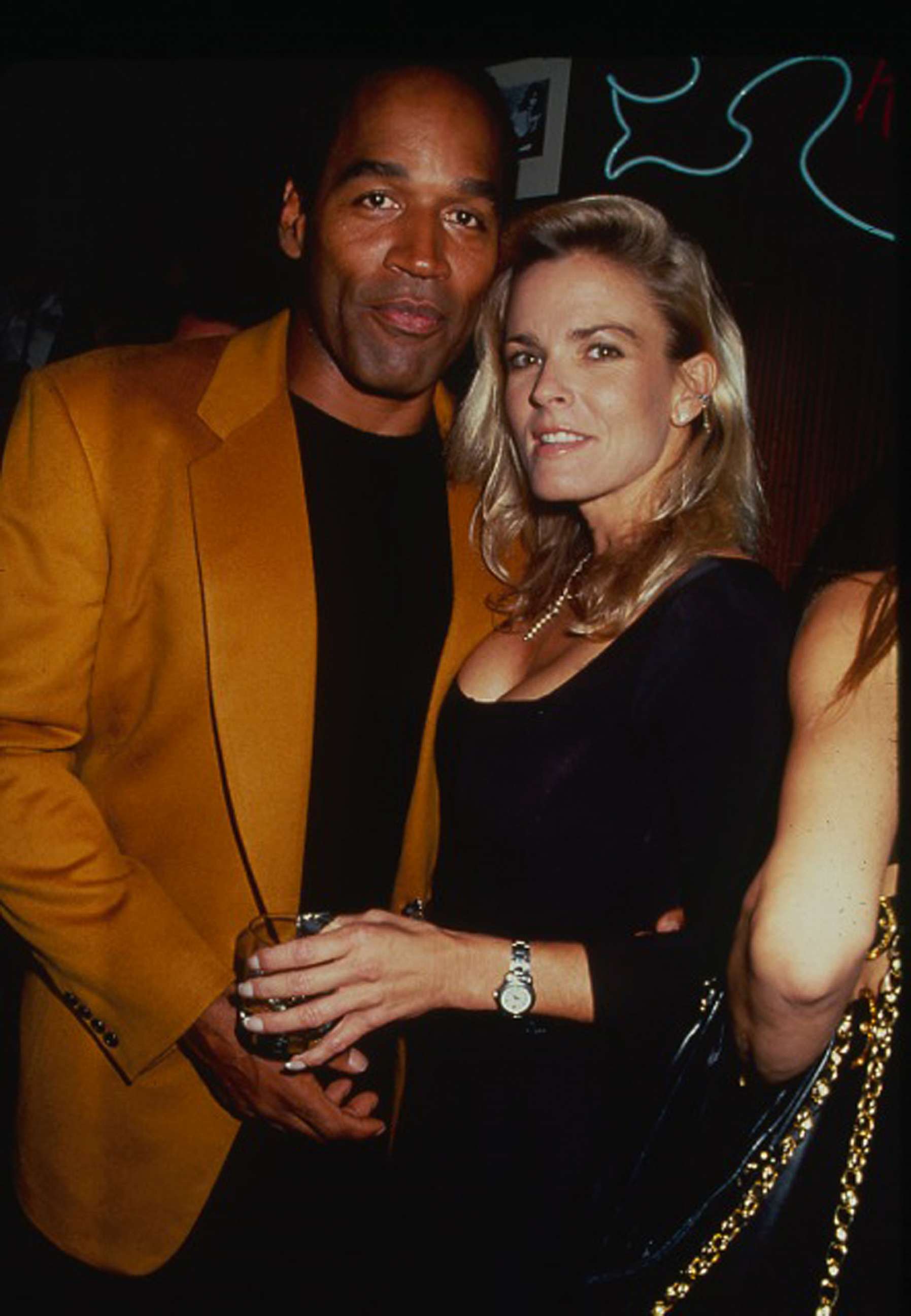 PHOTO: O.J. Simpson and his wife Nicole Brown Simpson attend a party at the Harley Davidson Cafe in New York City, circa 1993.
