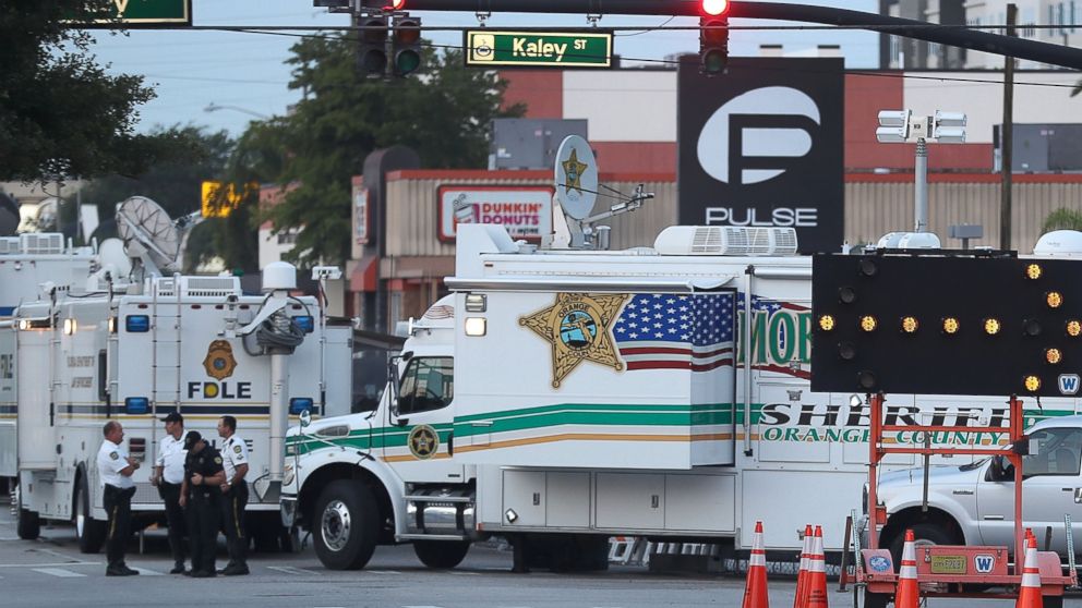 PHOTO: Law enforcement officials continue to investigate the Pulse gay nightclub where Omar Mateen killed 49 people on June 15, 2016 in Orlando, Florida.