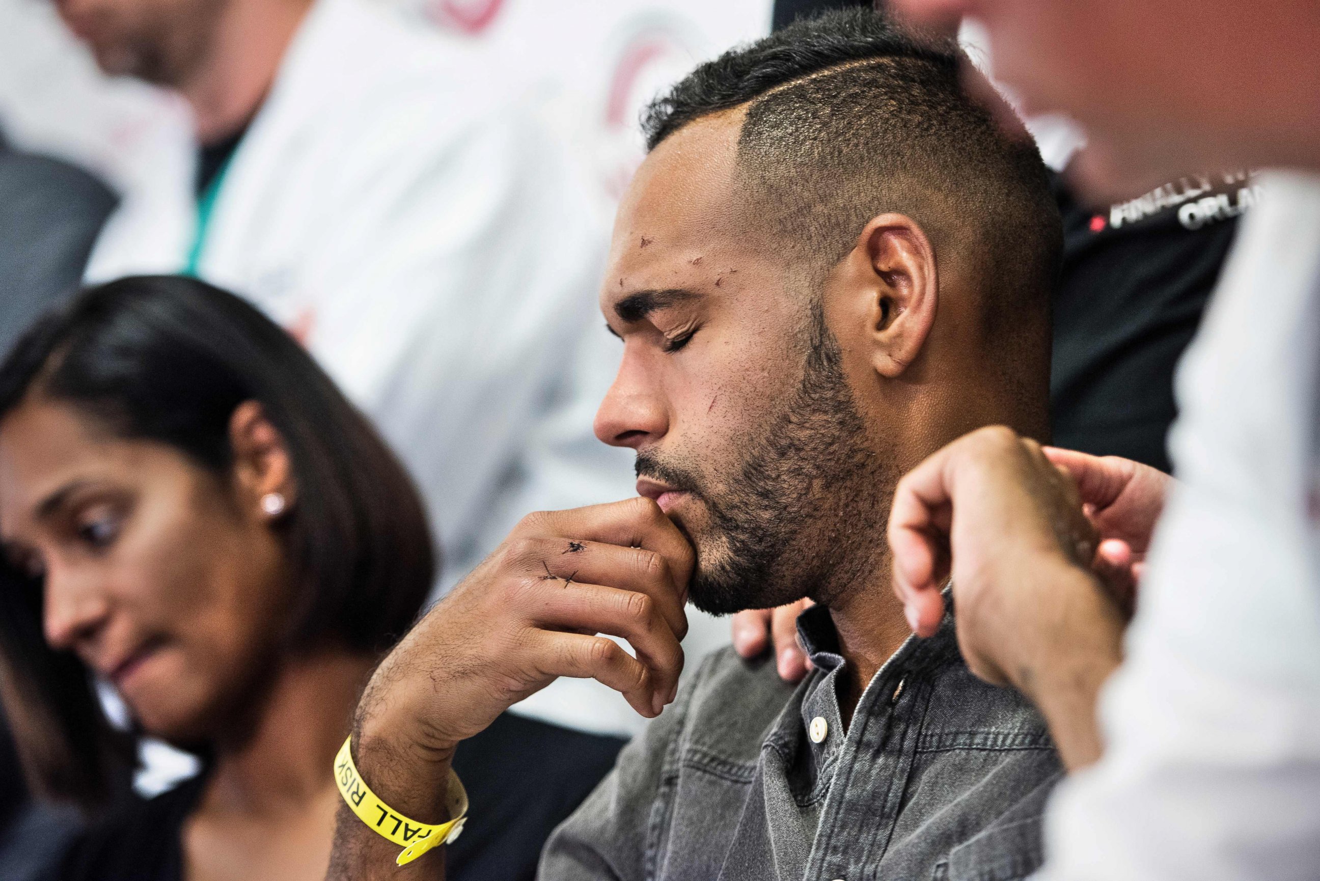 PHOTO: Angel Colon, a survivor of the Pulse nightclub mass shooting, listens during a press conference with Orlando Health trauma staff at Orlando Regional Medical Center, June 14, 2016 in Orlando, Florida.