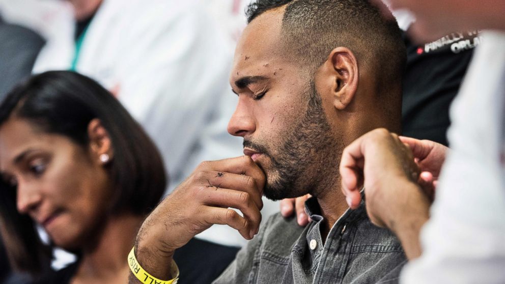 PHOTO: Angel Colon, a survivor of the Pulse nightclub mass shooting, listens during a press conference with Orlando Health trauma staff at Orlando Regional Medical Center, June 14, 2016 in Orlando, Florida.