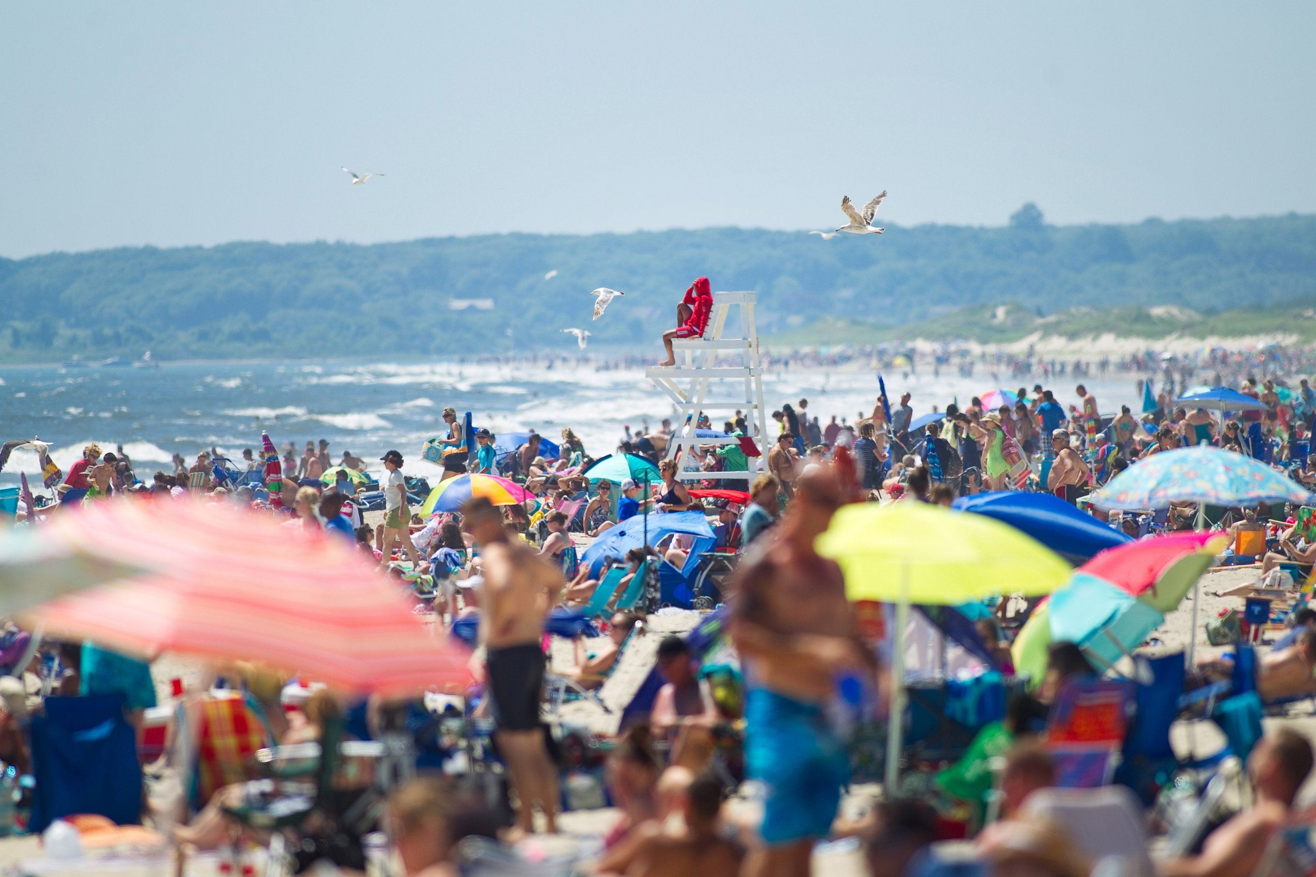 PHOTO: Beachgoers enjoy the weather at Horseneck Beach in Westport, Mass. on July 6, 2014.