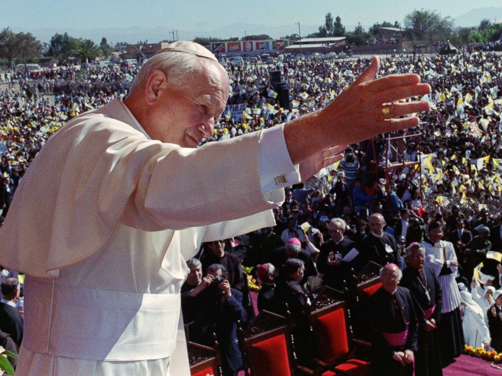 PHOTO: Pope John Paul II blesses Bolivian faithful May 13, 1988 at Tajira airport.