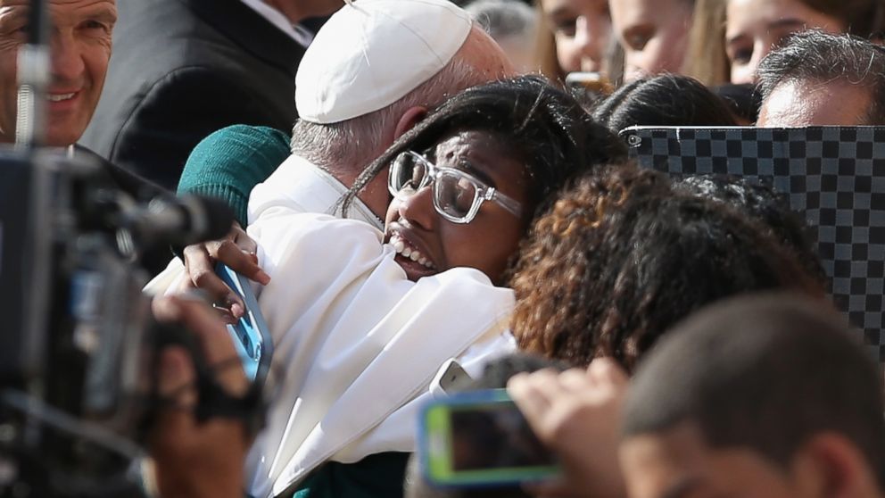 PHOTO: Pope Francis greets school children upon his arrival to the Lady Queen of Angels school on Sept. 25, 2015 in the Harlem neighborhood of New York.
