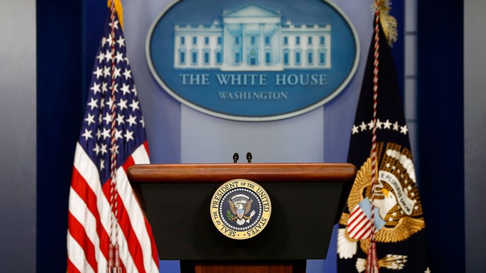 The American flag sits next to a empty speaker podium before U.S. President Barack Obama gives a statement during a press conference in the Brady Press Briefing Room of the White House on Aug. 18, 2014 in Washington. 