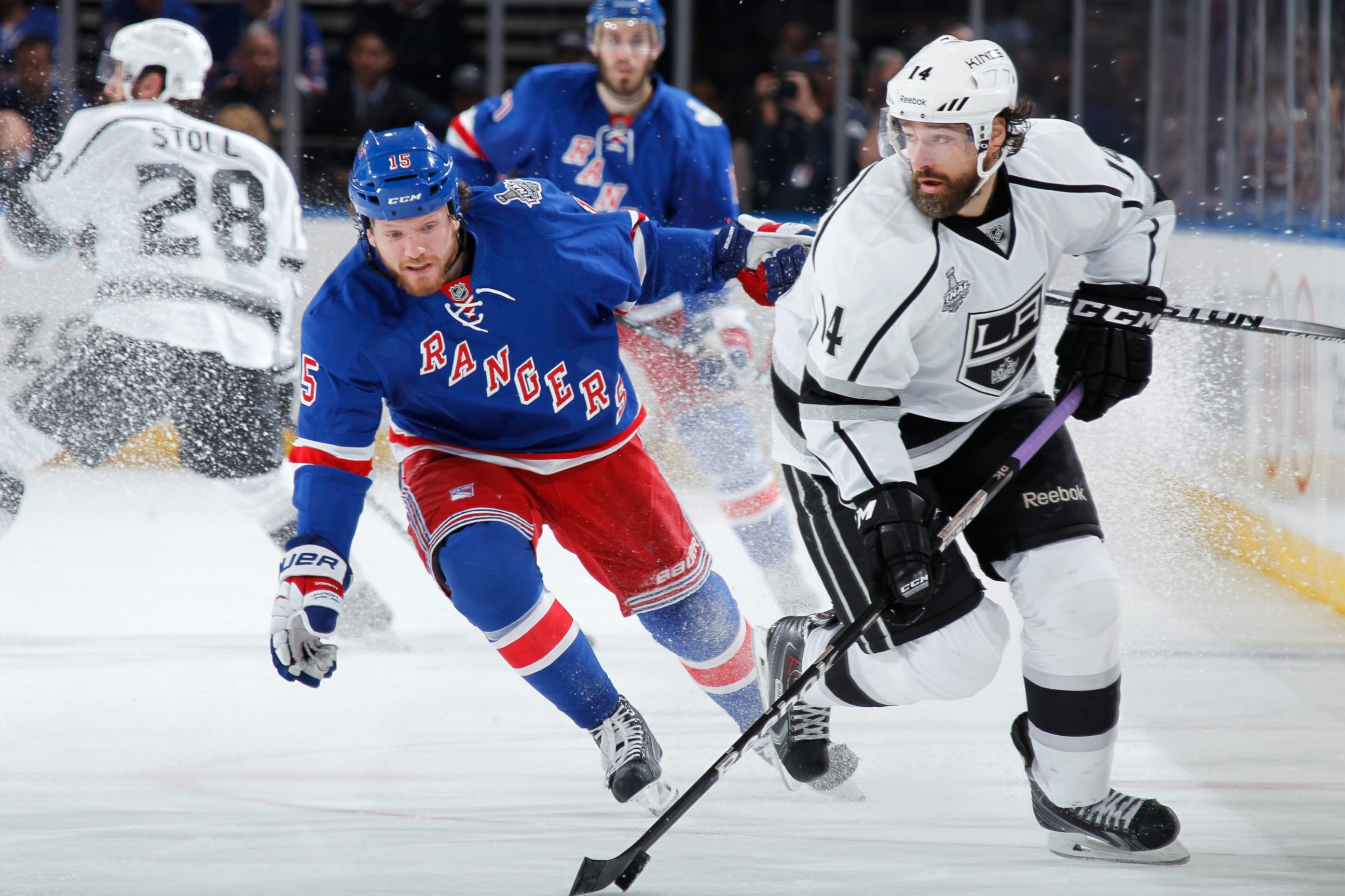 PHOTO: Derek Dorsett #15 of the New York Rangers skates against Justin Williams #14 of the Los Angeles Kings during Game Four of the 2014 NHL Stanley Cup Final at Madison Square Garden on June 11, 2014 in New York City. 