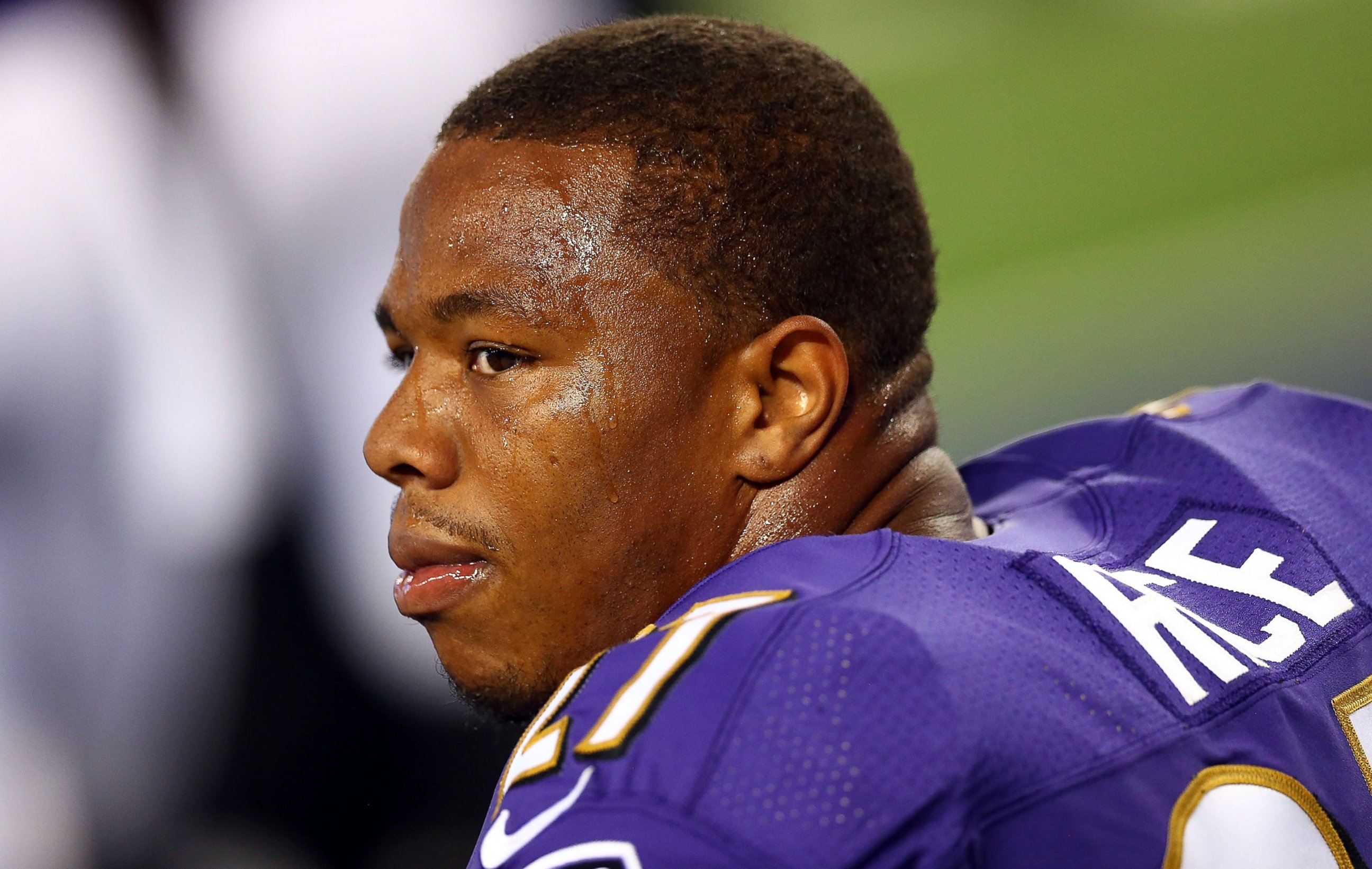 PHOTO: Ray Rice of the Baltimore Ravens sits on the bench against the Dallas Cowboys at AT&T Stadium on Aug. 16, 2014 in Arlington, Texas.