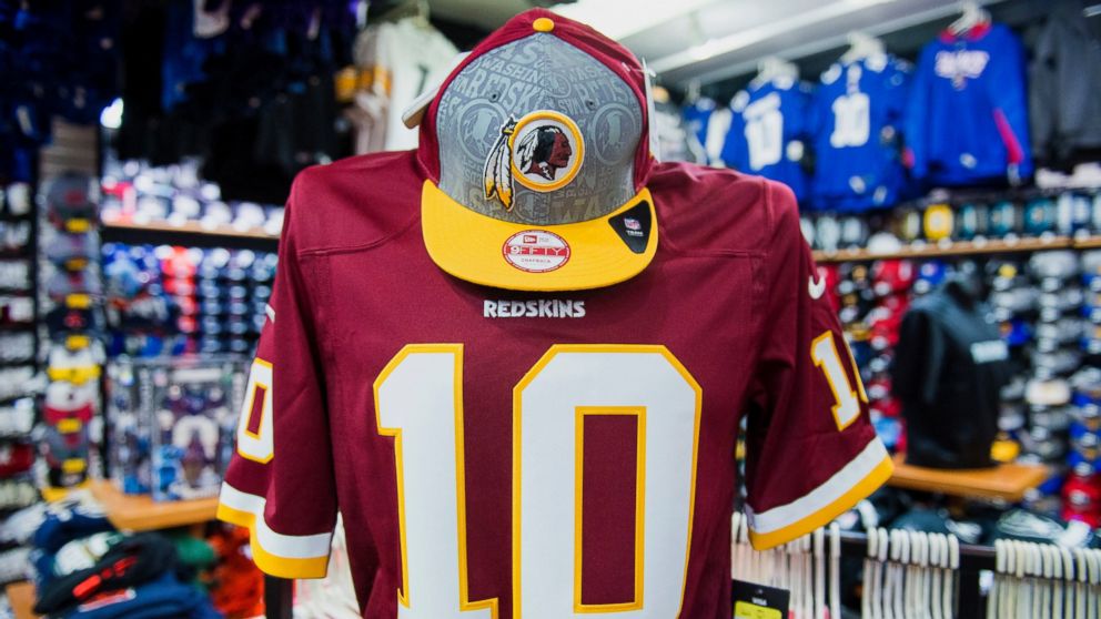 The Washington Redskins football team logo is displayed on a hat for sale at a store in San Francisco, June 18, 2014.