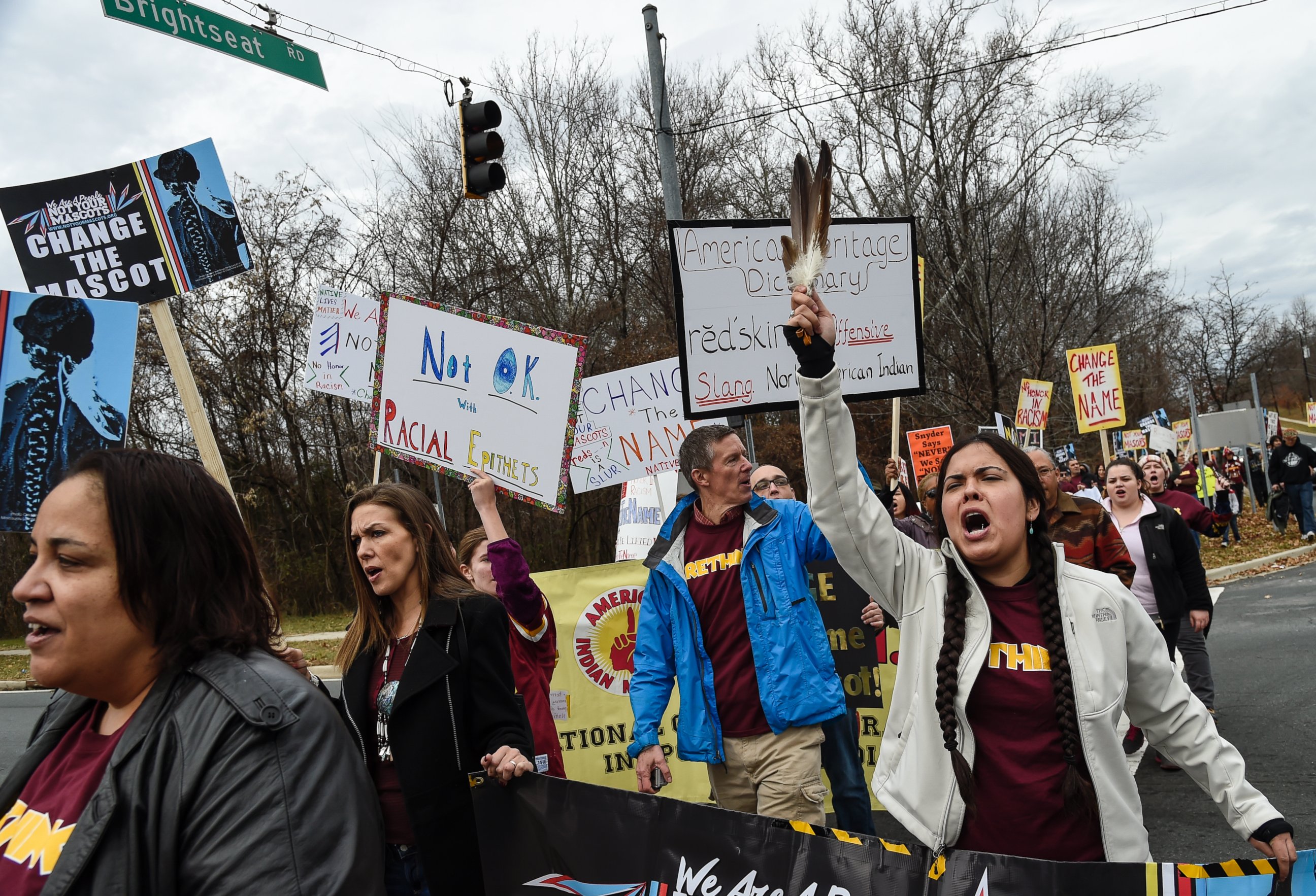PHOTO: Tara Houska, right, joins other Native Americans and supporters to protest the name and logo of the Washington Football team before the game on Dec. 28, 2014.