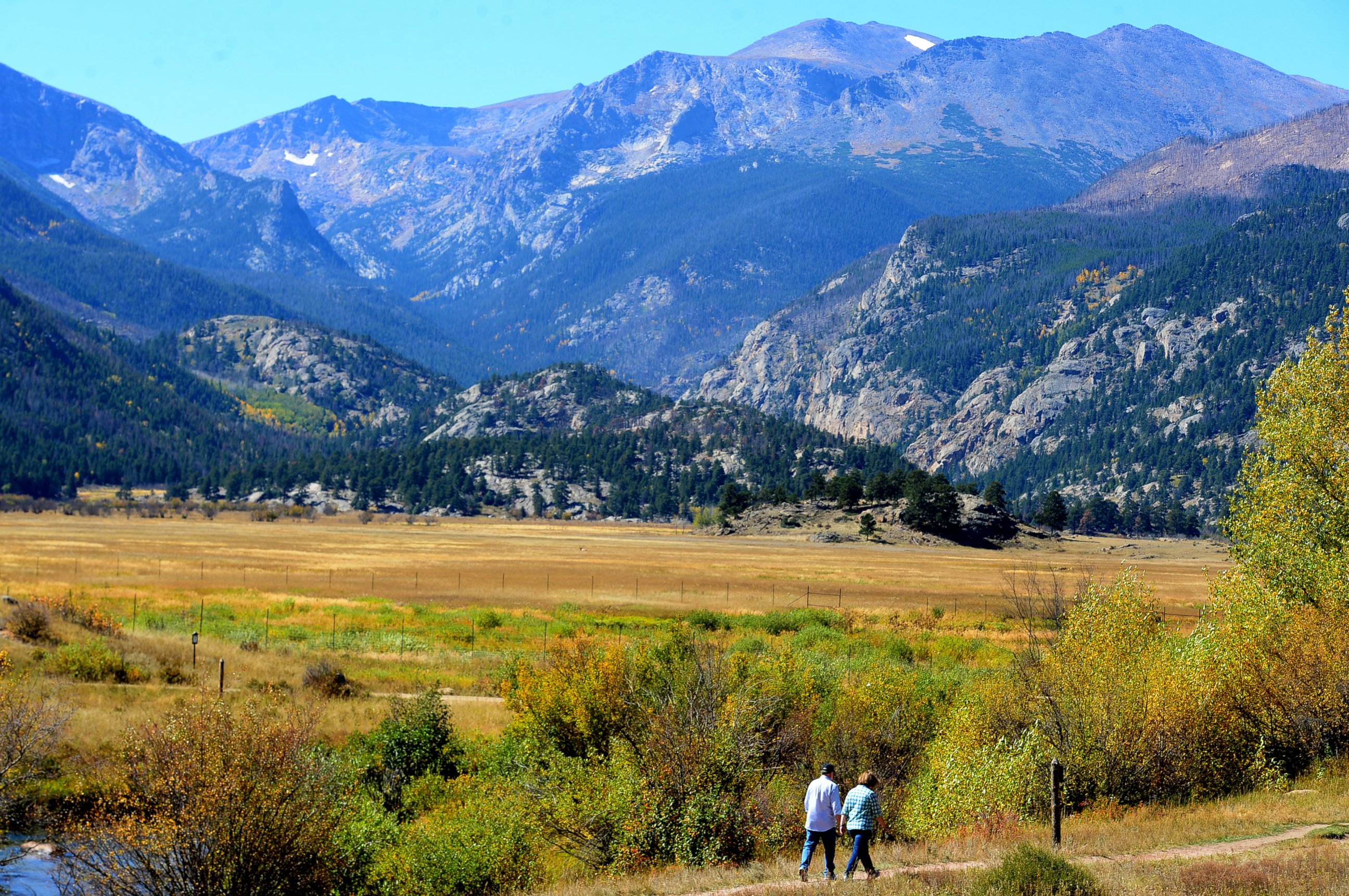PHOTO: Hikers walk a trail near Moraine Park in Rocky Mountain National Park in Estes Park, CO on Sept. 25, 2014.