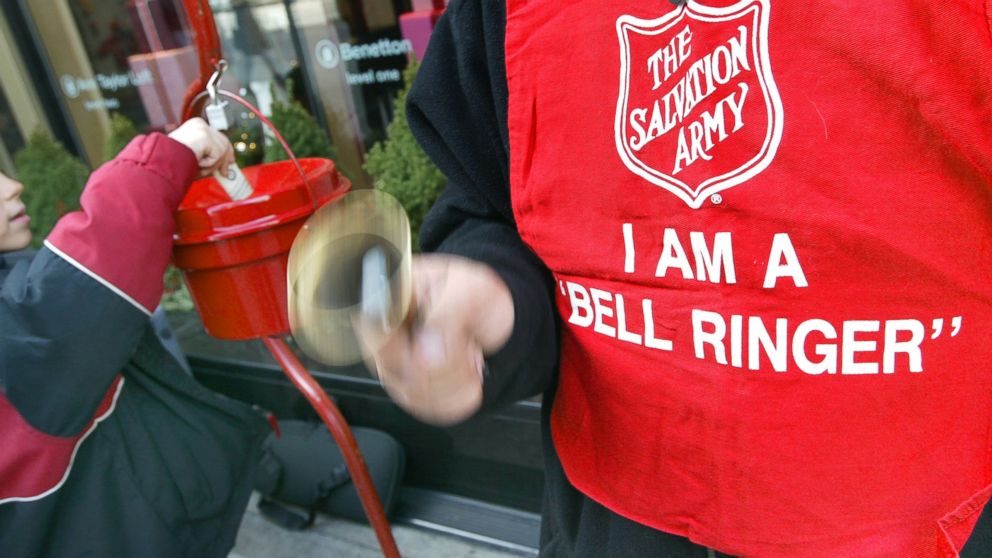 PHOTO: A donation is made as Salvation Army bell ringer Ruben Rios works outside a store as seen in this file photo taken on November 21, 2003 on the Magnificent Mile in Chicago. 