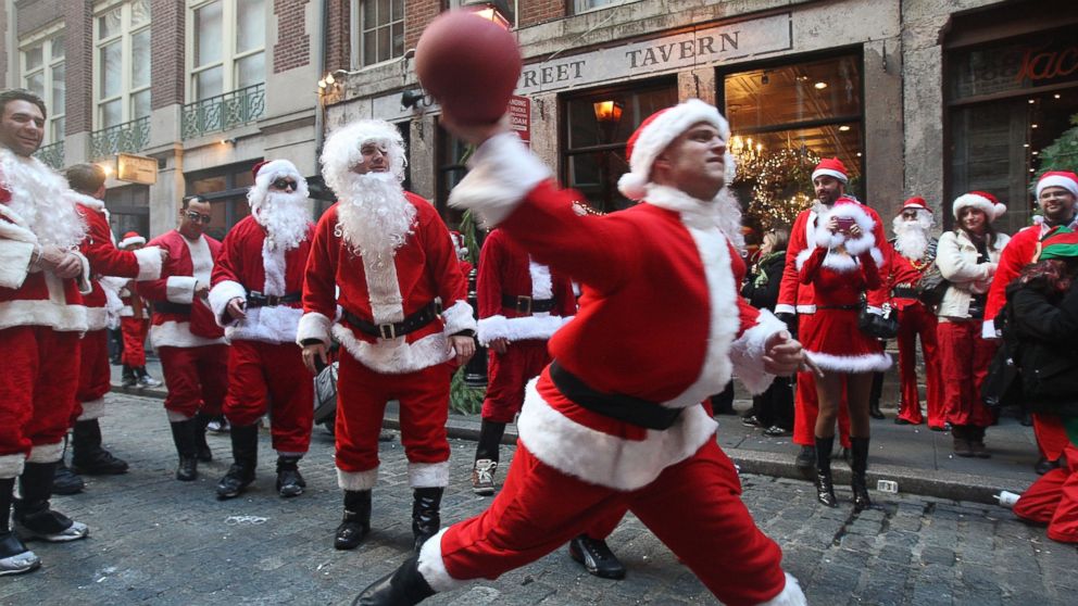 People dressed as Santa Claus celebrate during the annual SantaCon event in New York, in this Dec. 12, 2009, photo.