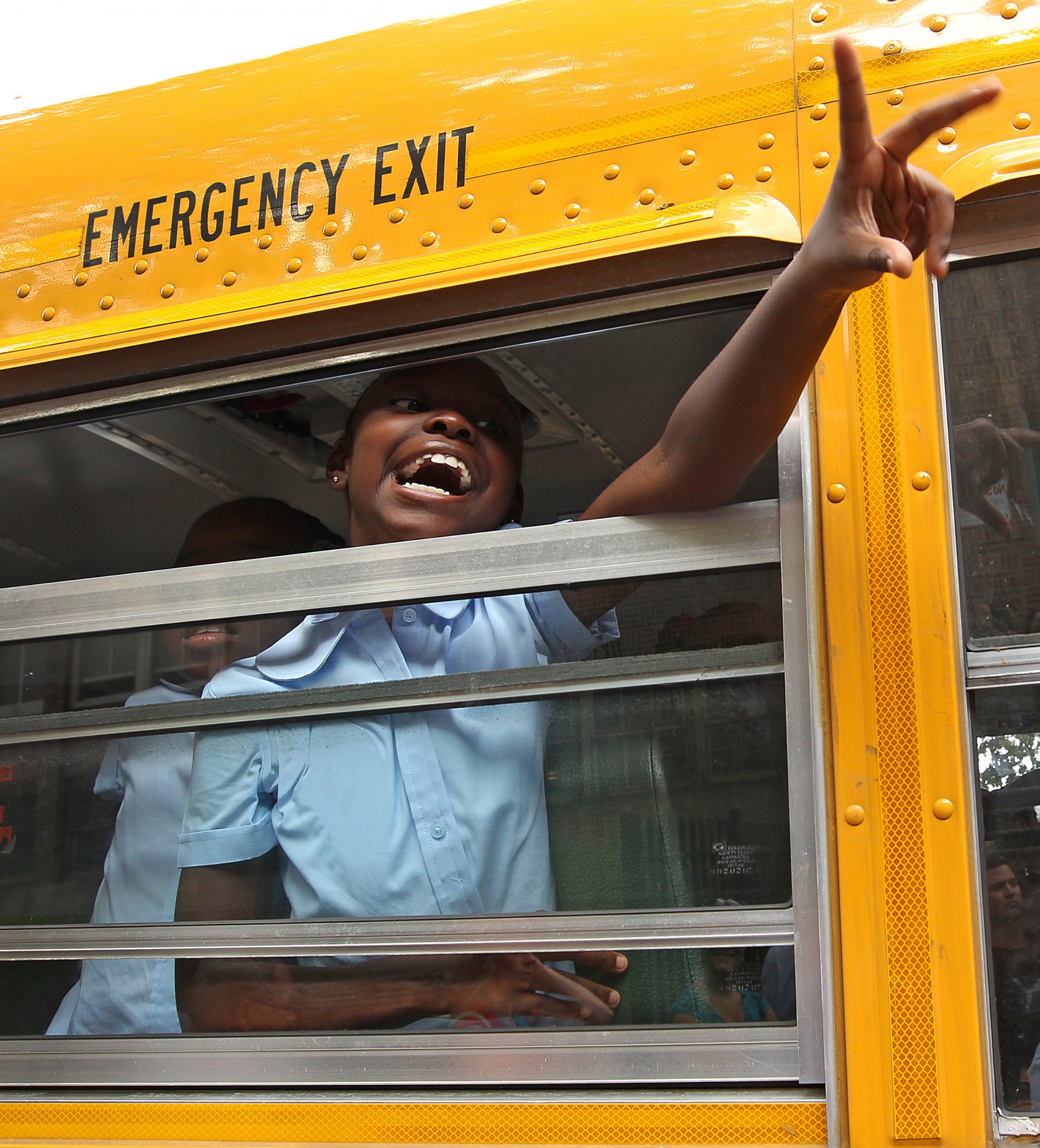 PHOTO: A third grade student arrives by bus on the first day of school at Ellis Elementary in Boston, Mass. on Sept. 5, 2012.