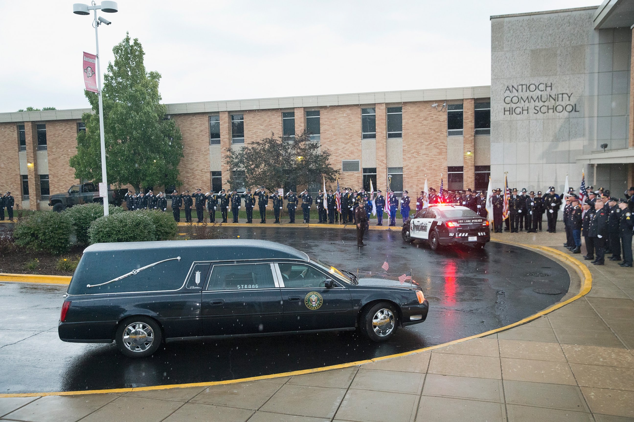PHOTO: The coffin of slain Fox Lake police officer Lt. Joe Gliniewicz is brought to Antioch Community High School for his visitation and funeral service on Sept. 7, 2015.