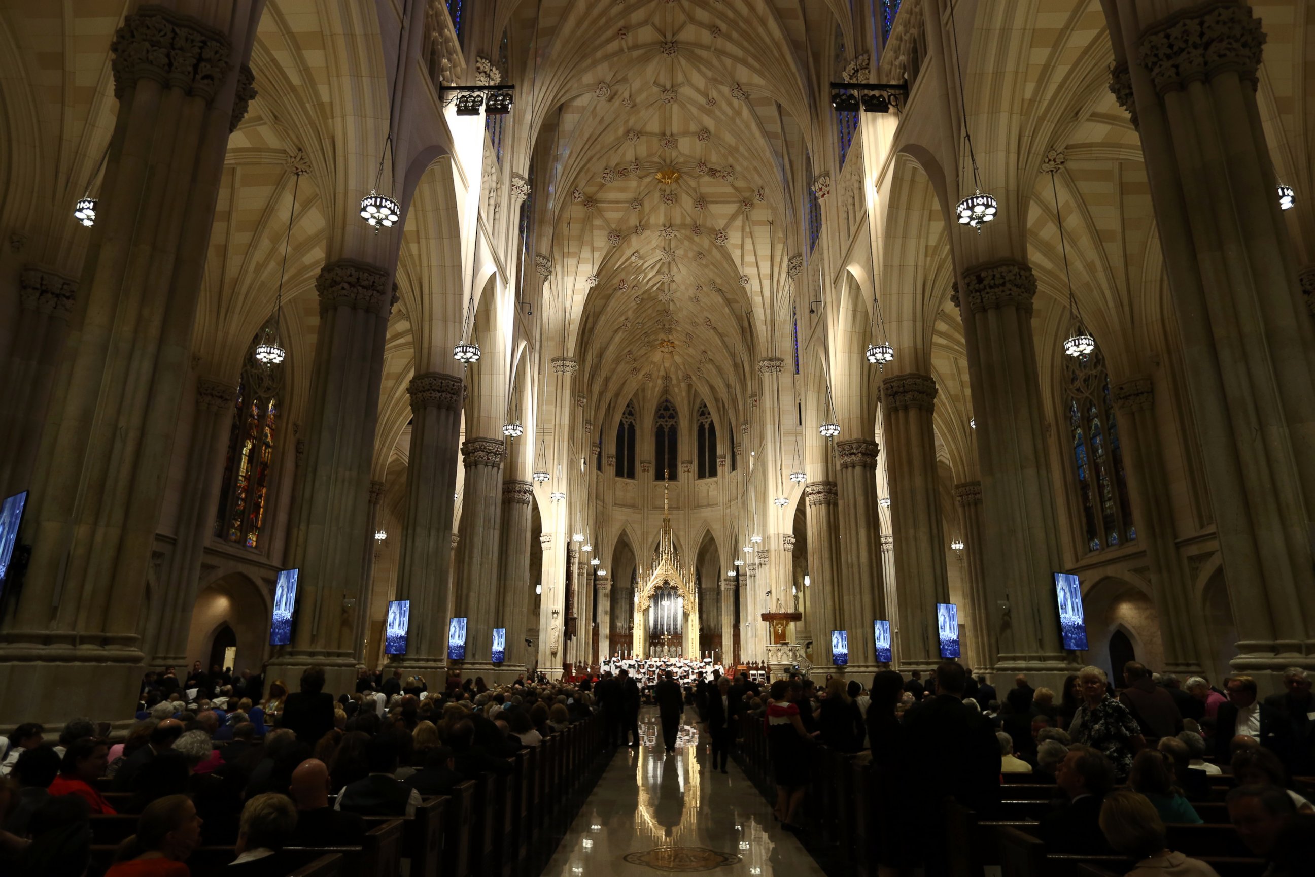 PHOTO: People gather in St Patrick's Cathedral ahead of the arrival of Pope Francis on Sept. 24, 2015 in New York.