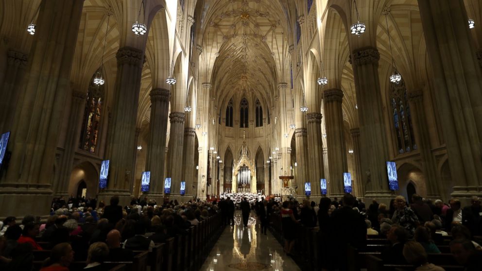 PHOTO: People gather in St Patrick's Cathedral ahead of the arrival of Pope Francis on Sept. 24, 2015 in New York.