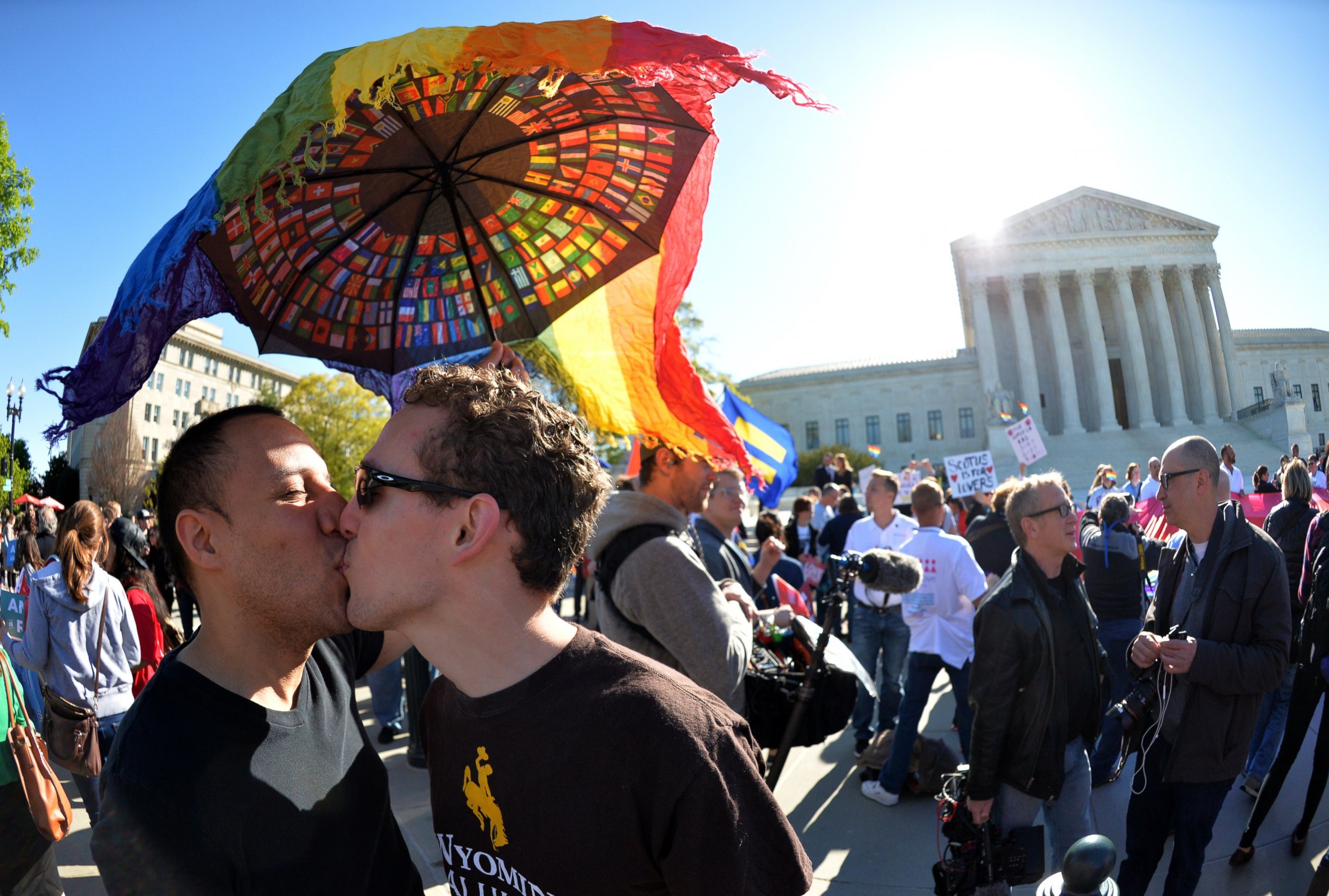 PHOTO: A gay couple kisses outside the US Supreme Court on April 28, 2015 as the court hears arguments on whether gay couples have a constitutional right to wed - a potentially historic decision that could see same-sex marriage recognized nationwide.