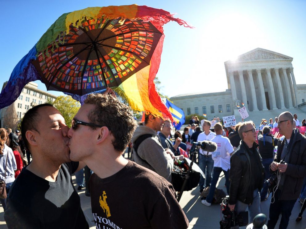 PHOTO: A gay couple kisses outside the US Supreme Court on April 28, 2015 as the court hears arguments on whether gay couples have a constitutional right to wed - a potentially historic decision that could see same-sex marriage recognized nationwide.