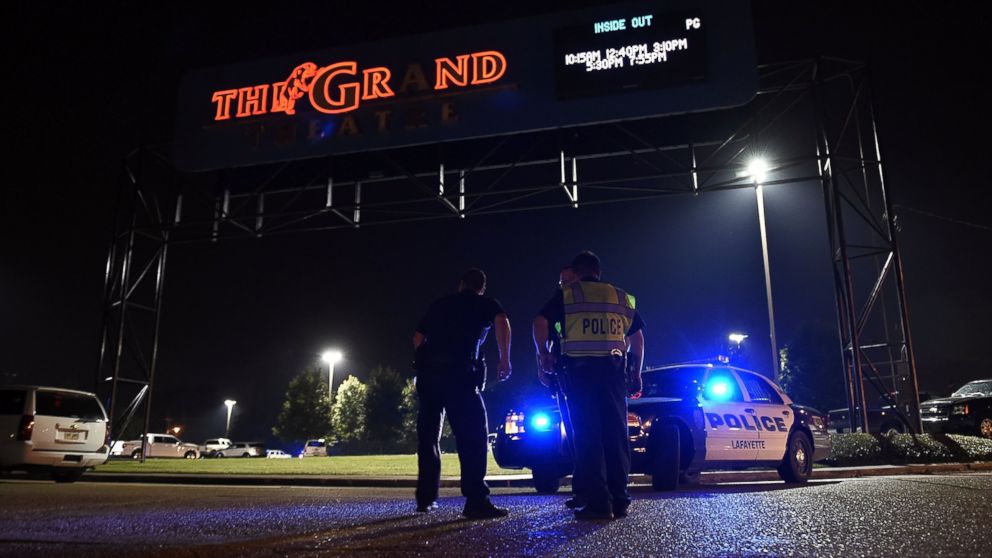 Lafayette police stand outside of the Grand Theater, July 23, 2015, in Lafayette, La.