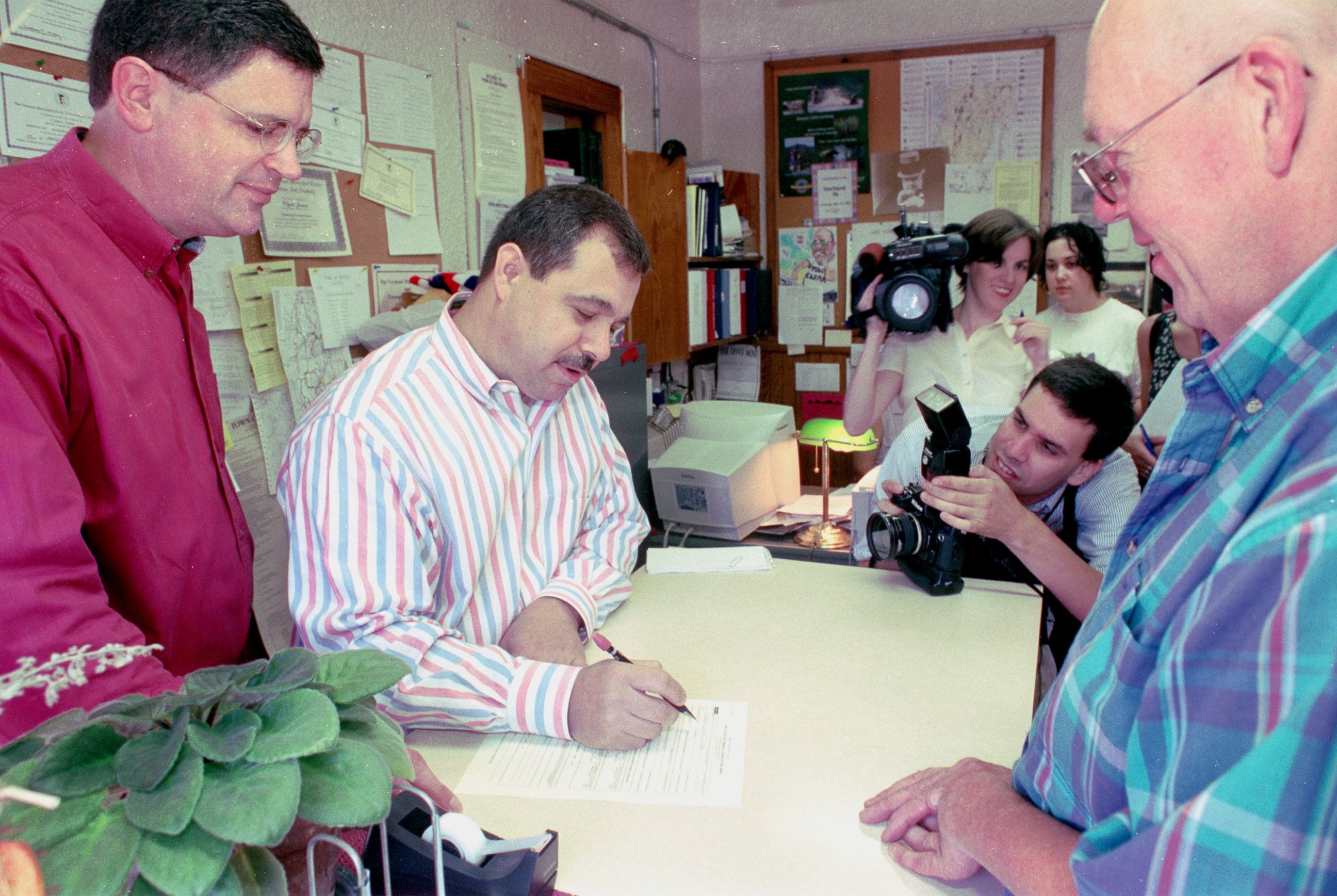 PHOTO: Joe Skirchak and Pat Cerra of Plainfield, N.H., fill out civil union paperwork with Hartland, Vt., town clerk Clyde Jenne on July 1, 2000.