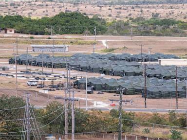 Migrants held at Guantanamo now allowed to phone attorneys, filing says