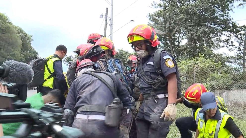 PHOTO: Rescue workers are working to search for relatives they haven't heard from since Sunday's eruption of Volcan de Fuego in Guatemala.