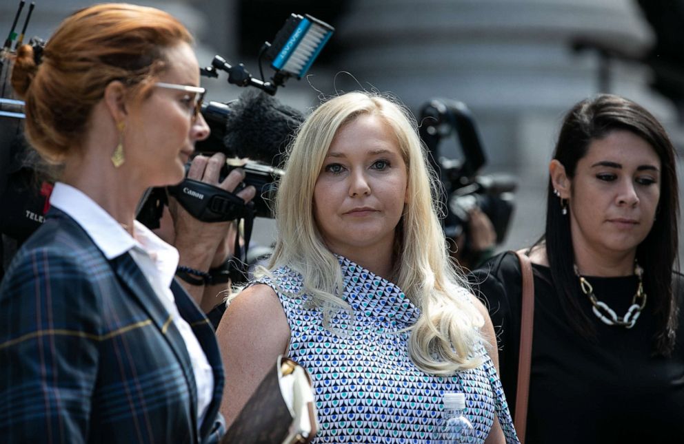 PHOTO: Virginia Roberts Giuffre, an alleged victim of Jeffrey Epstein, center, exits from federal court in New York on Aug. 27, 2019.