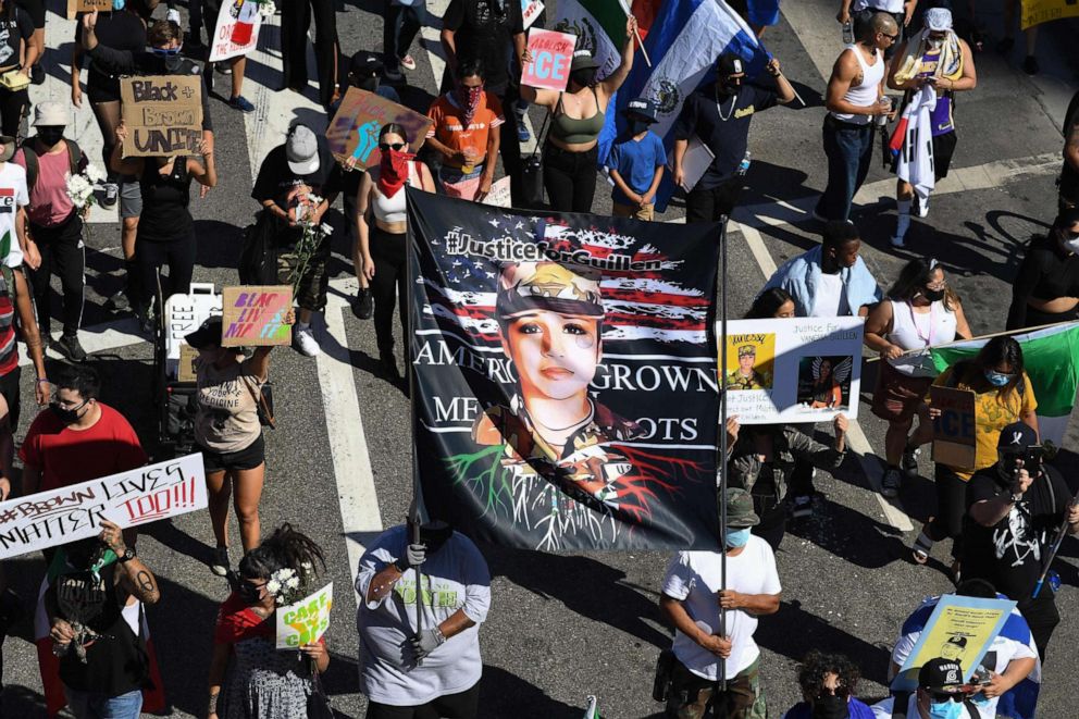 PHOTO: Demonstrators hold a banner demanding justice for slain US Army solder Vanessa Guillen in Los Angeles, California, on July 12, 2020.