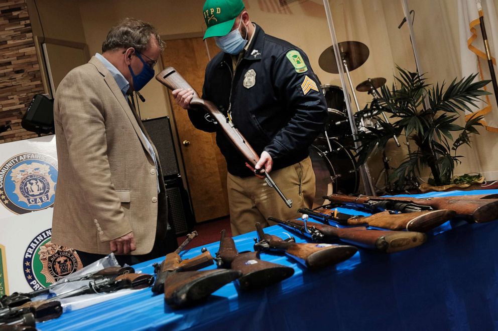 PHOTO: Guns are displayed on a table during a gun buy-back event at a church in Staten Island, April 24, 2021, in New York.