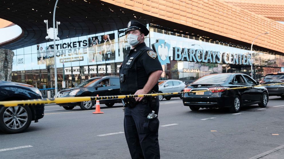 PHOTO: Police investigate a crime scene outside of the Barclay's Center in downtown Brooklyn, N.Y., Oct. 1, 2021.