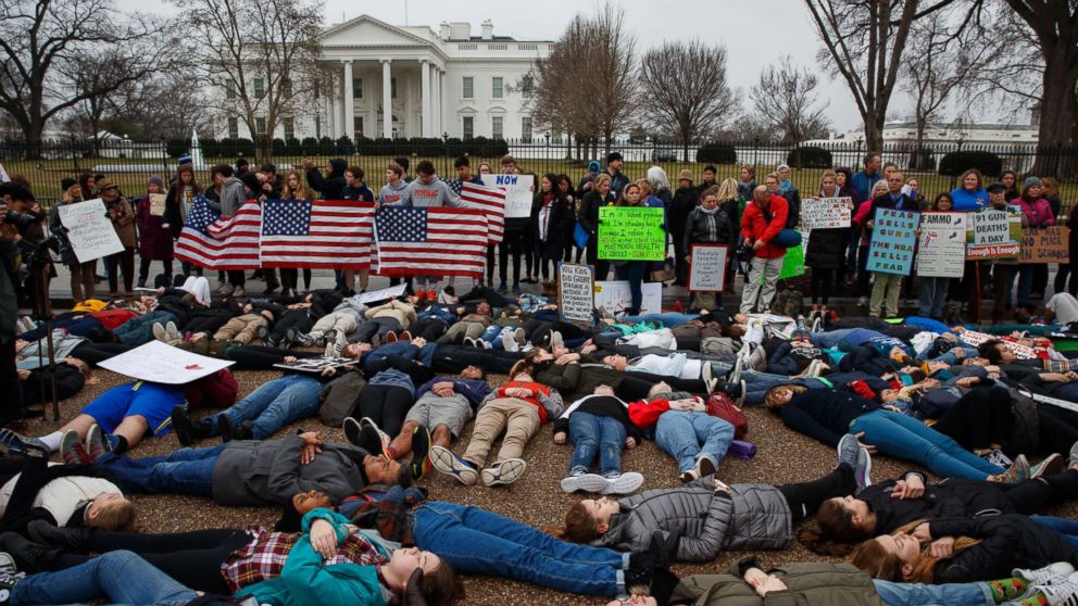 Demonstrators participate in a "lie-in" during a protest in favor of gun control reform in front of the White House in Washington, D.C., Feb. 19, 2018.