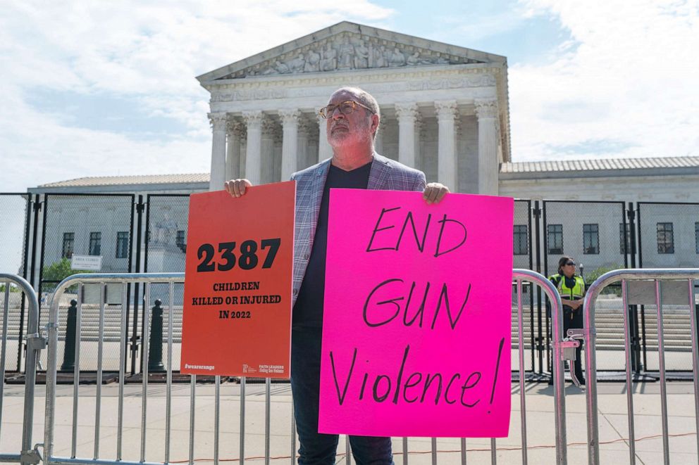 PHOTO: Rev. Patrick Mahoney, with the group Faith Leaders Ending Gun Violence, protests gun violence, 
on June 8, 2022, outside the Supreme Court in Washington, D.C.