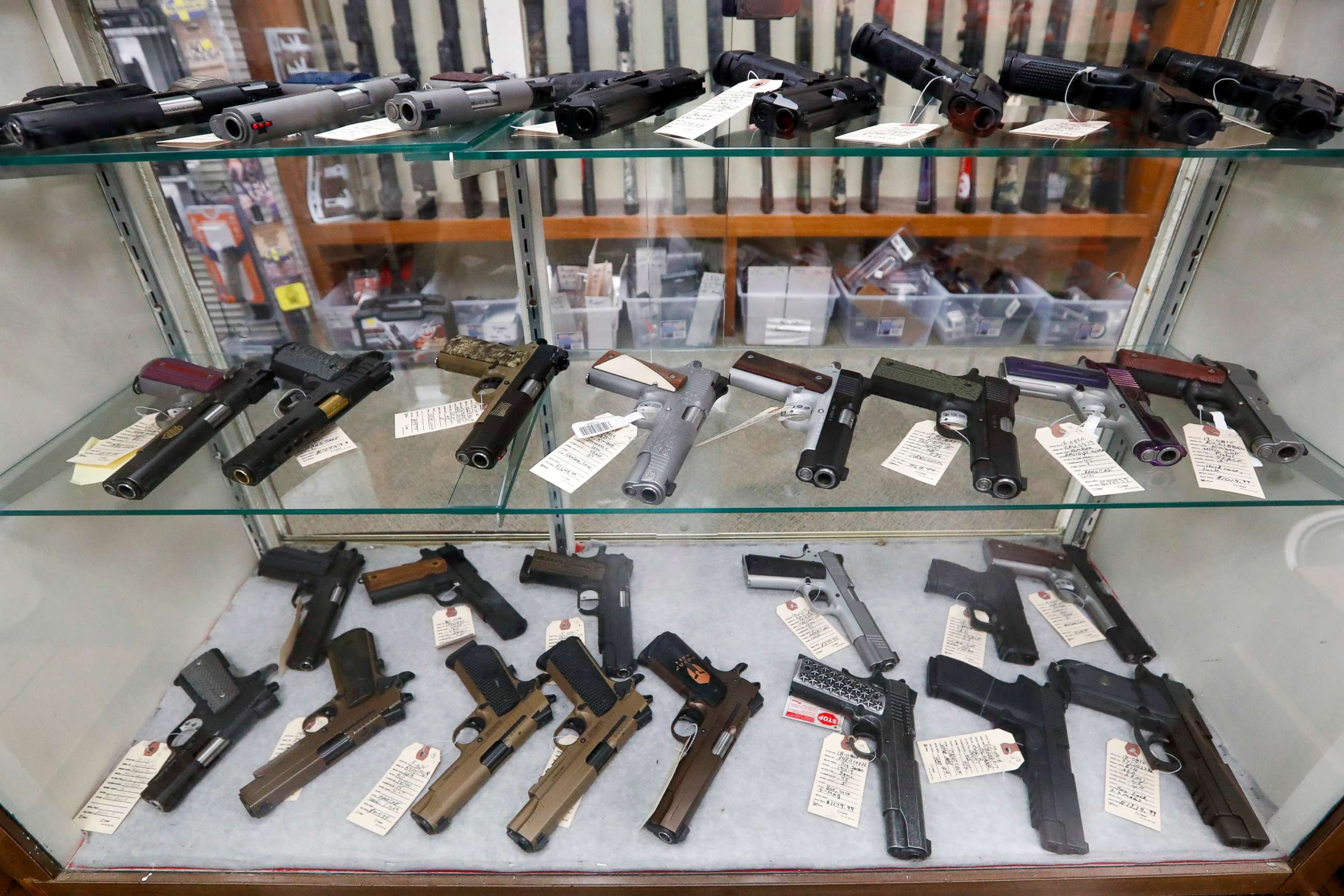 PHOTO: Semi-automatic handguns are displayed at shop in New Castle, Pa., March 25, 2020.